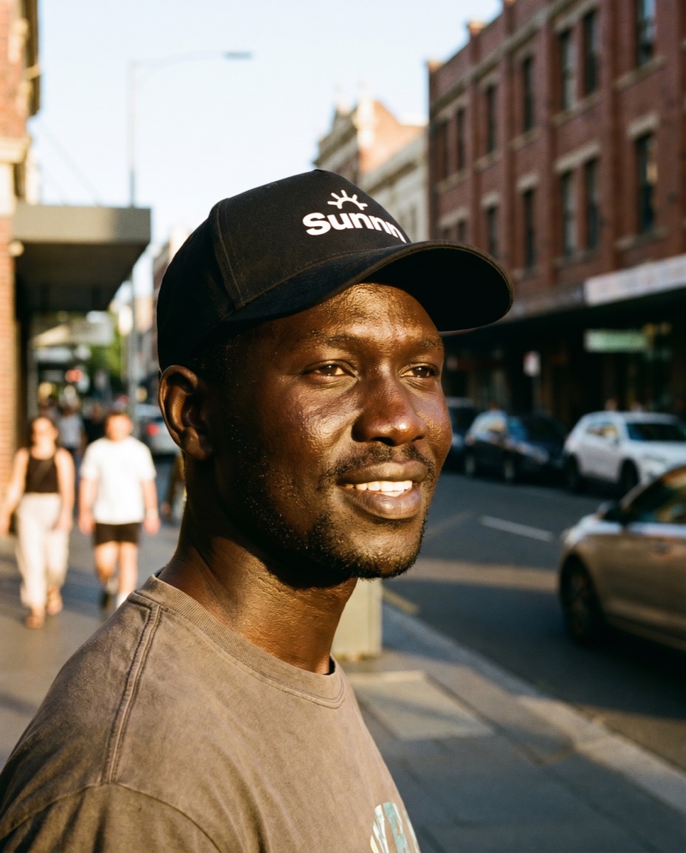 A customer wearing the Sunnn cap
